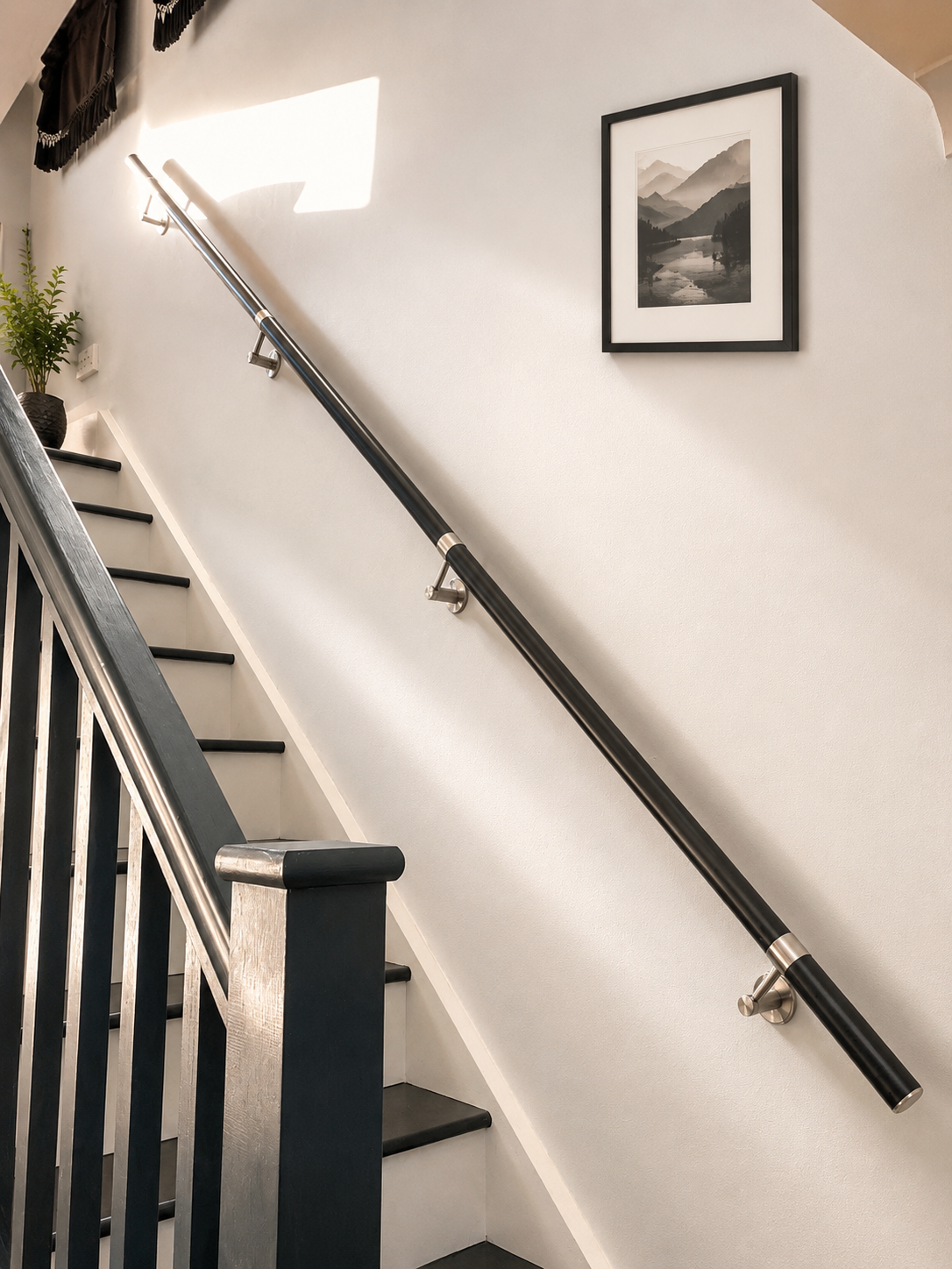 Black Handrail Installation for a Narrow Staircase